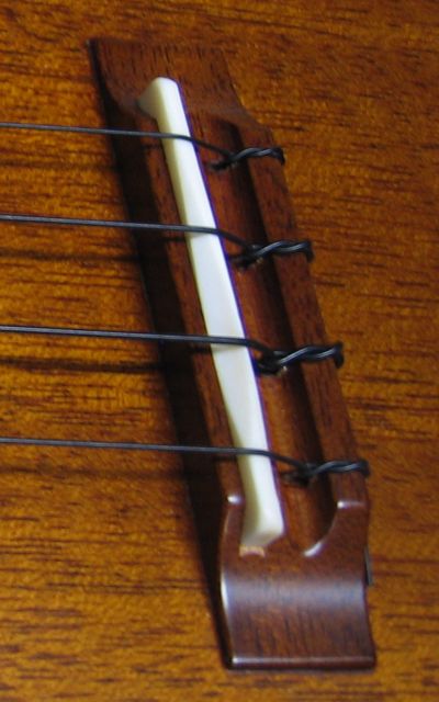 Compensated Ukulele
        Saddle